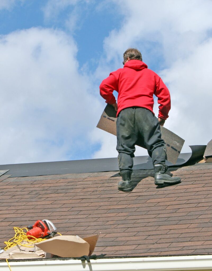 A man repairing a roof in Columbus, Ohio.